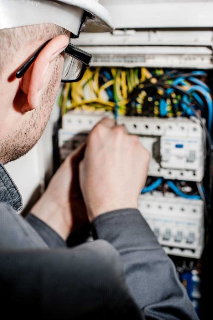 Electrician upgrading an electric panel