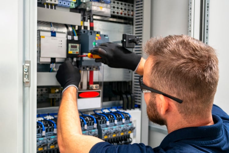 Electrician fixing the safety box.